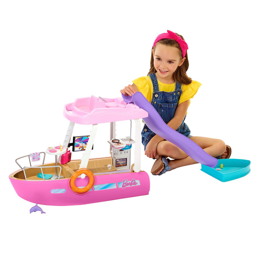 Barbie Dream Boat playset with pool, slide, dolphin, and over 20 accessories, showcasing a vibrant marine-themed scene.