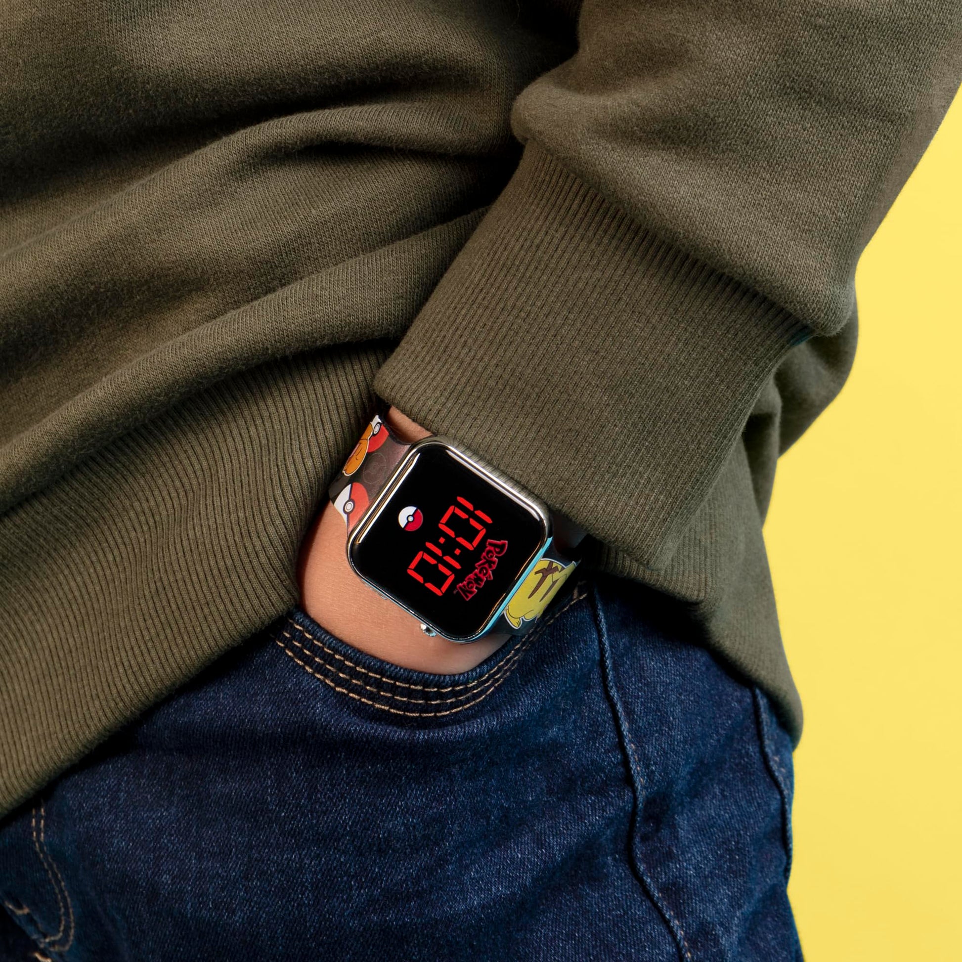 Pokémon Black LED Watch featuring a printed silicone strap, showcasing a sleek design and vibrant colors.