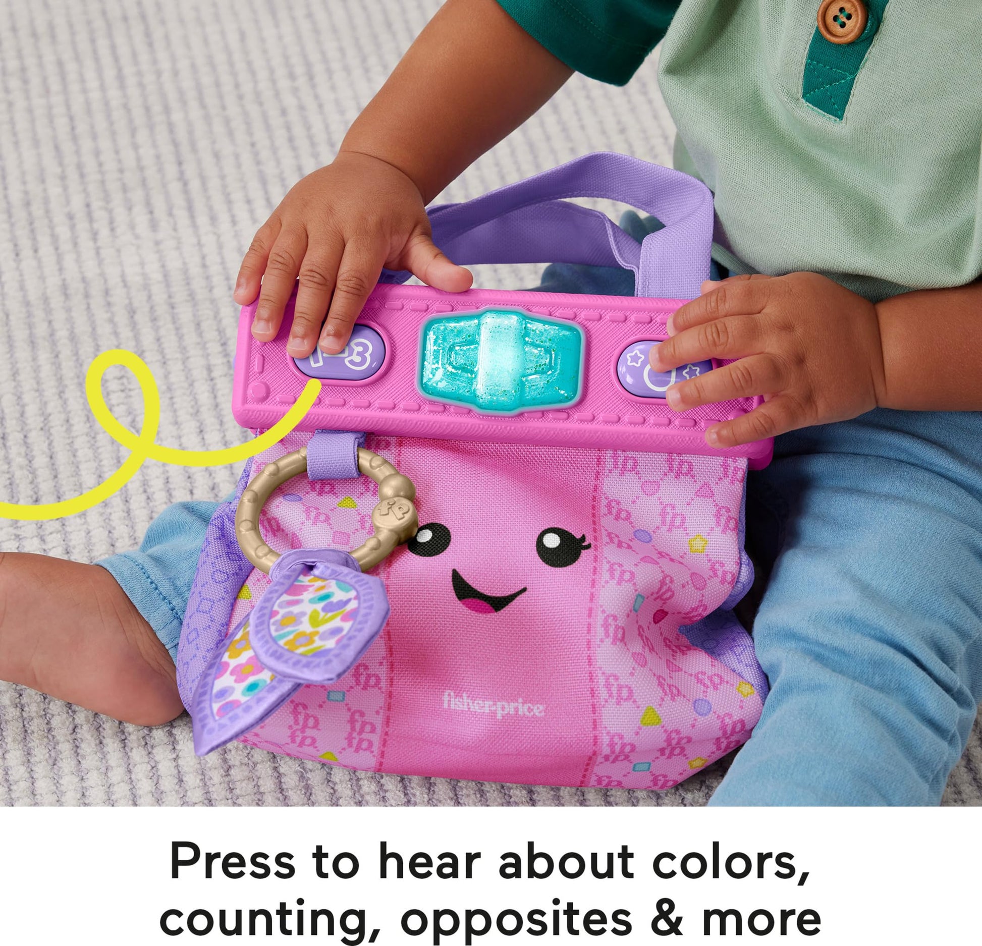 Fisher-Price Laugh & Learn Purse toy for babies, featuring pretend play accessories and colorful design for infants and toddlers.