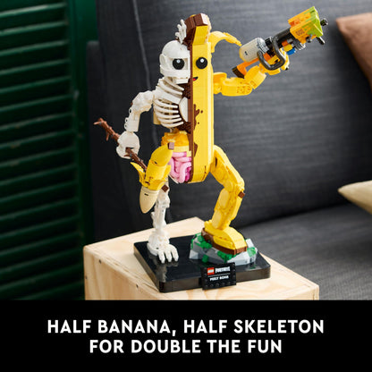 LEGO Fortnite Peely Bone collectible figure with paint launcher and Peely Pick Pickaxe, perfect for display and gaming fans.