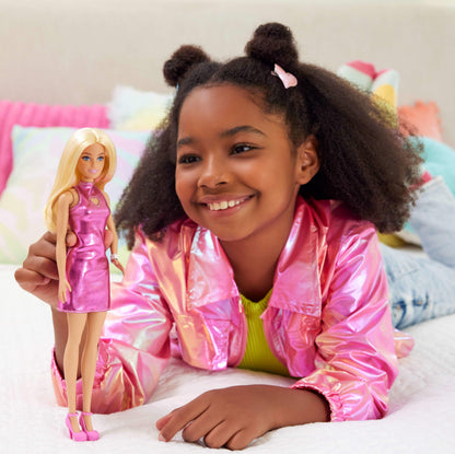 Barbie Fashionistas Doll #230 with blonde hair in metallic pink minidress, heart cut-out, white bracelet, and heels.