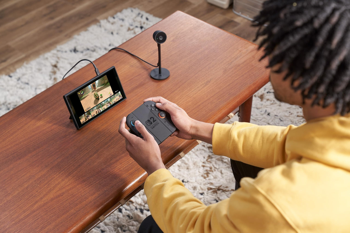 Nintendo Switch 2 Camera showing the device with dual lenses and screen, designed for gaming and video recording.