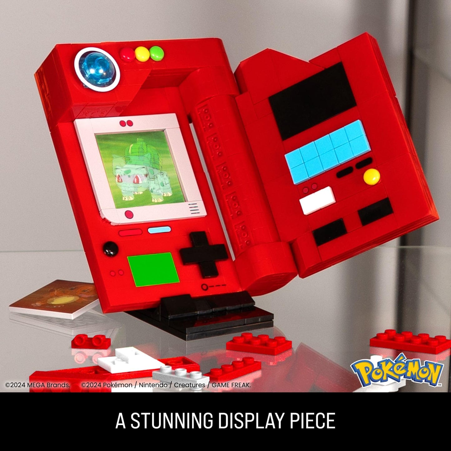 MEGA Pokémon Building Toys Set featuring Kanto Region Pokédex, 322 pieces, light, and 5 lenticular cards displayed.