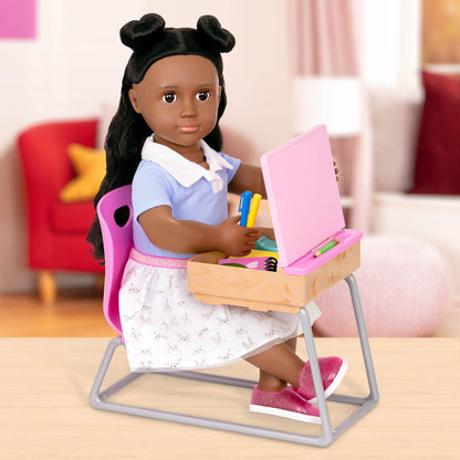 Our Generation Flying Colours Set featuring a school desk and classroom supplies for 18-inch dolls, 46-piece playset.