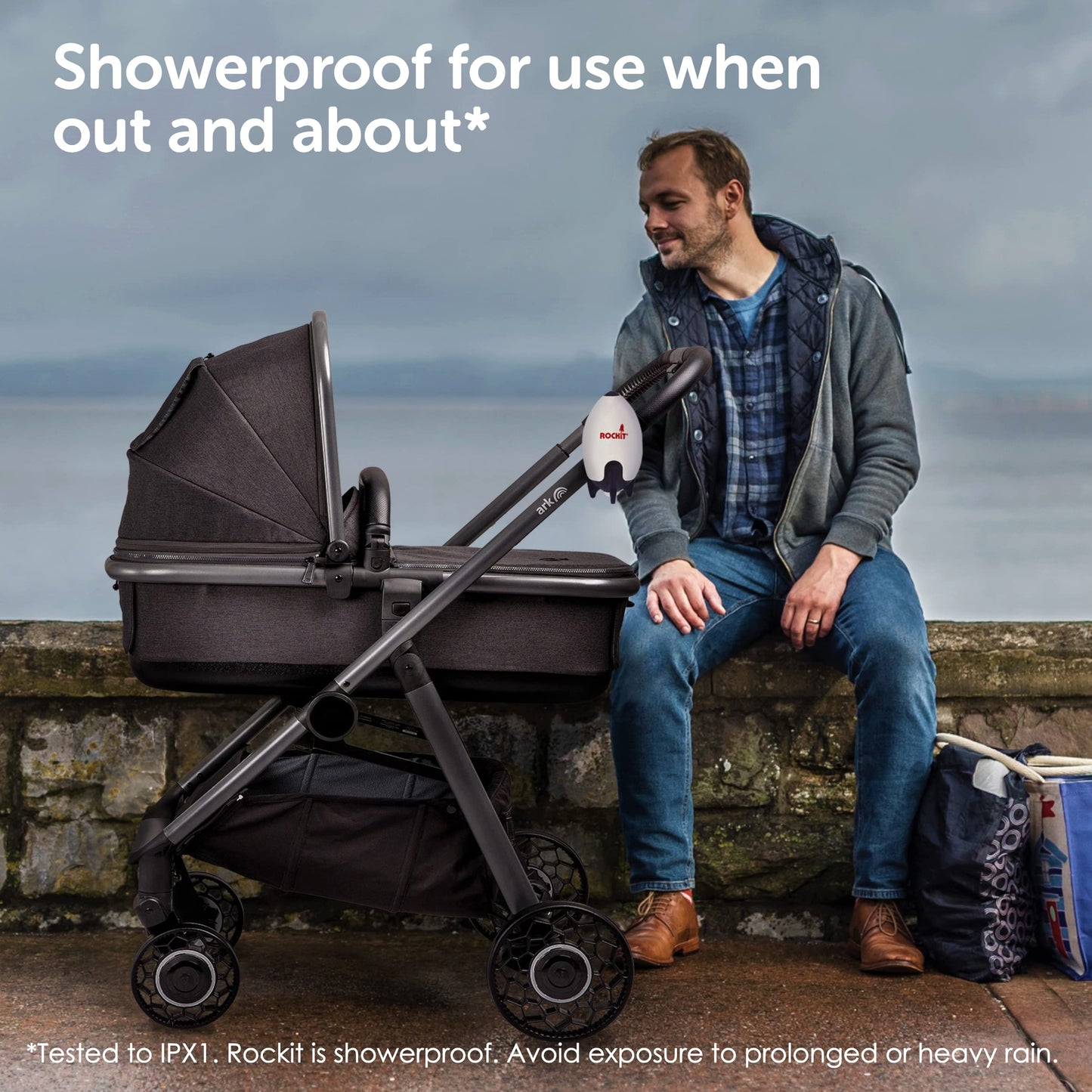 ROCKIT Rocker rechargeable baby sleep aid attached to stroller, showing adjustable speed control and universal fit for pram or buggy.