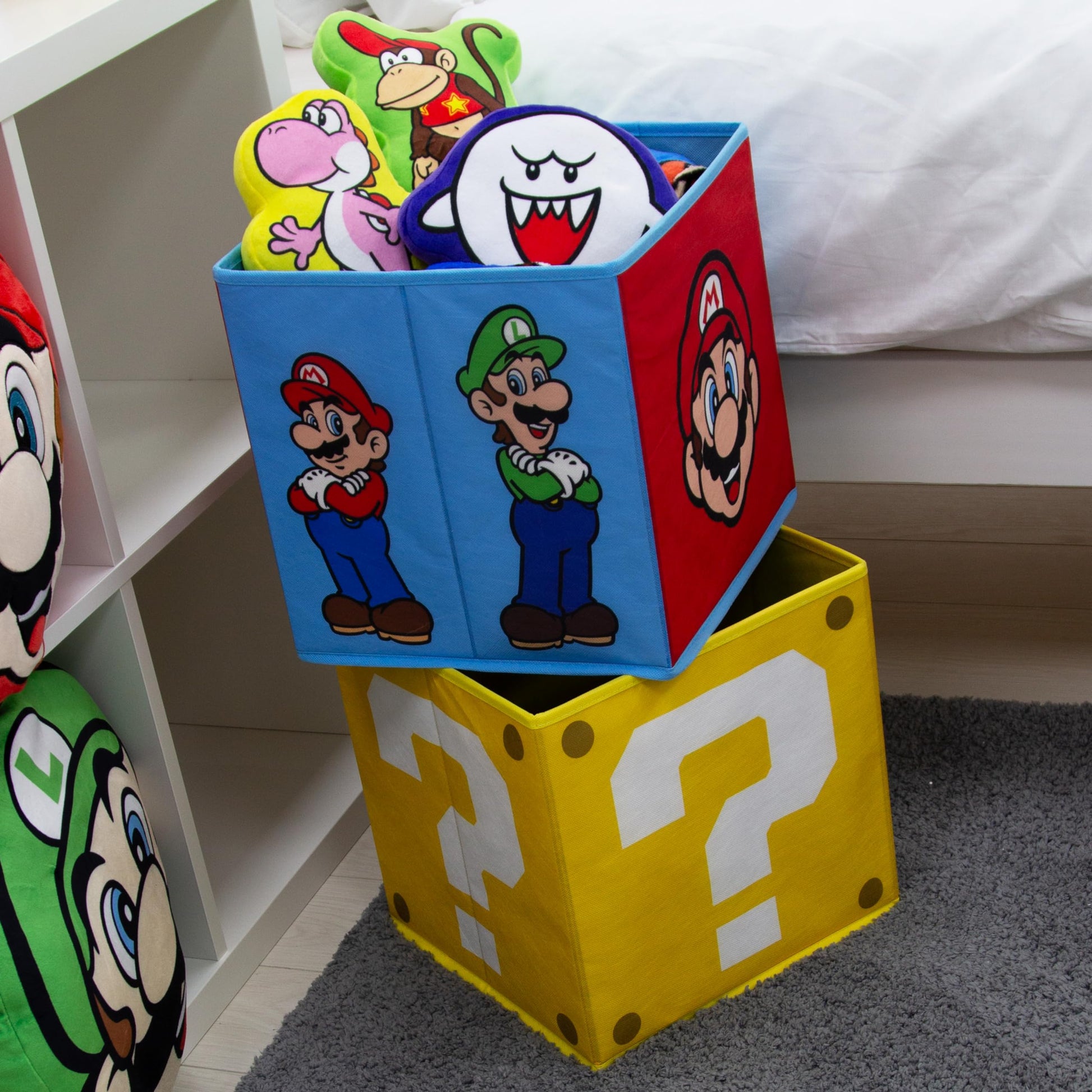 Nintendo Super Mario storage boxes by Character World, foldable cubes with Mario and Luigi faces, ideal for kids' room organization.