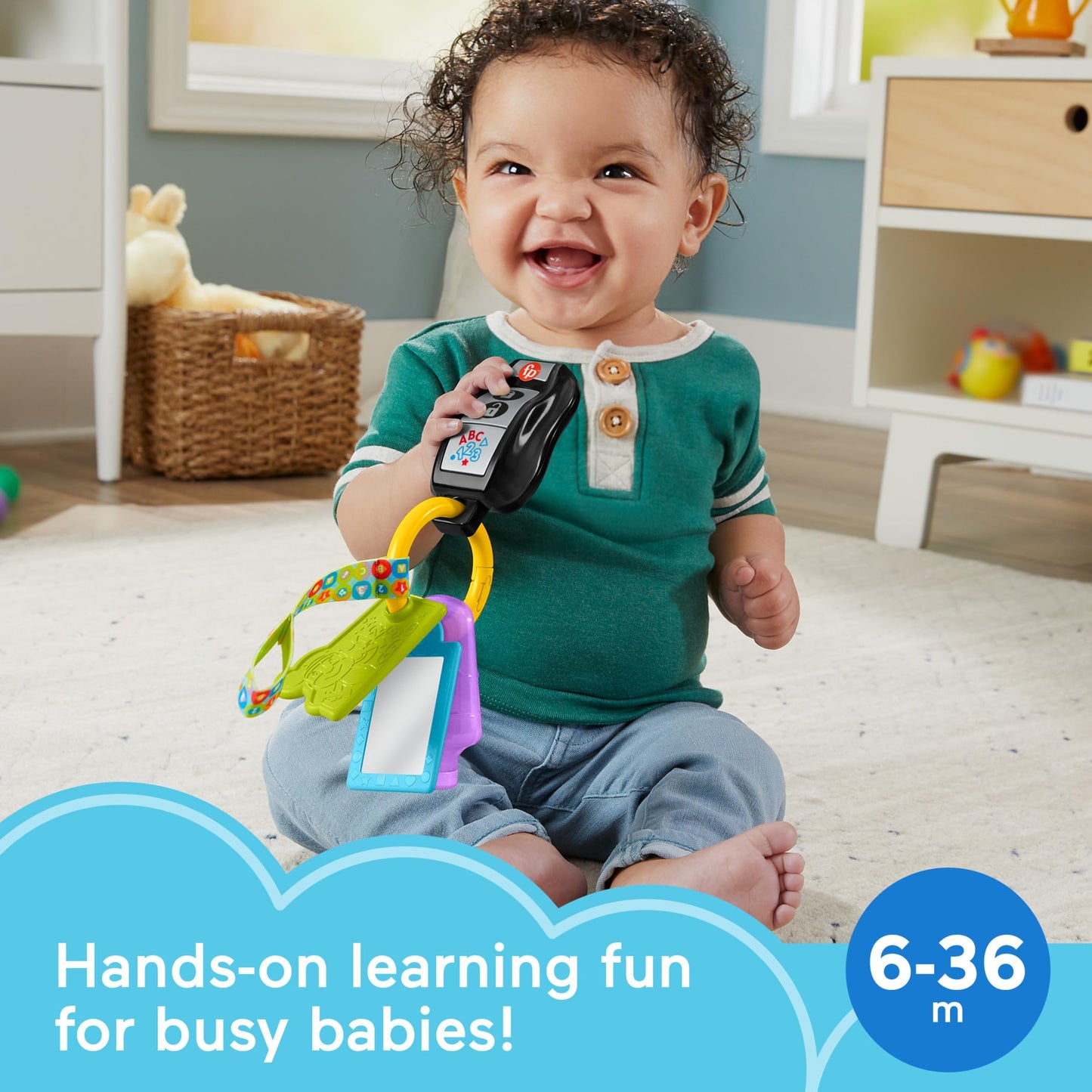 Fisher-Price Laugh & Learn baby musical toy with colorful keys, teether, and mirror for children 6+ months, UK, French, and German version