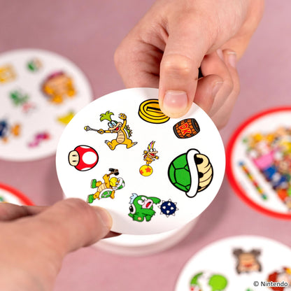 Asmodee Dobble Super Mario family card game with colorful game cards, suitable for ages 6+ and 2-8 players.
