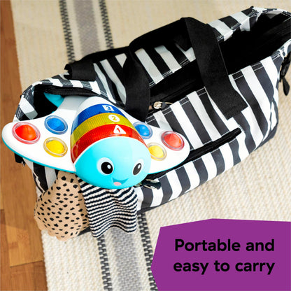 Baby Einstein Ocean Explorers Stingray Popper toy for babies 6 months and up, featuring colorful ocean-themed design and interactive features.