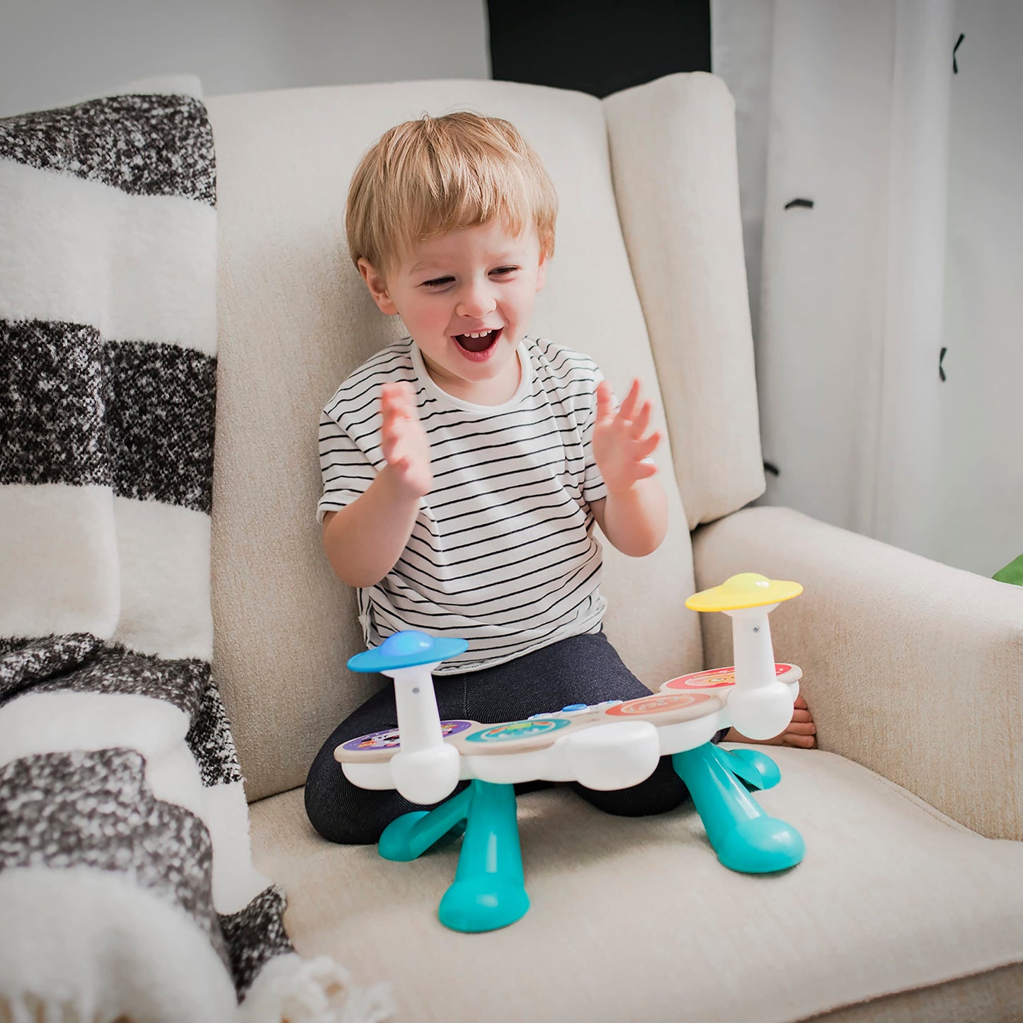 Baby Einstein Together in Tune Drums toddler musical toy with wireless wooden drums, suitable for ages 12 months+.