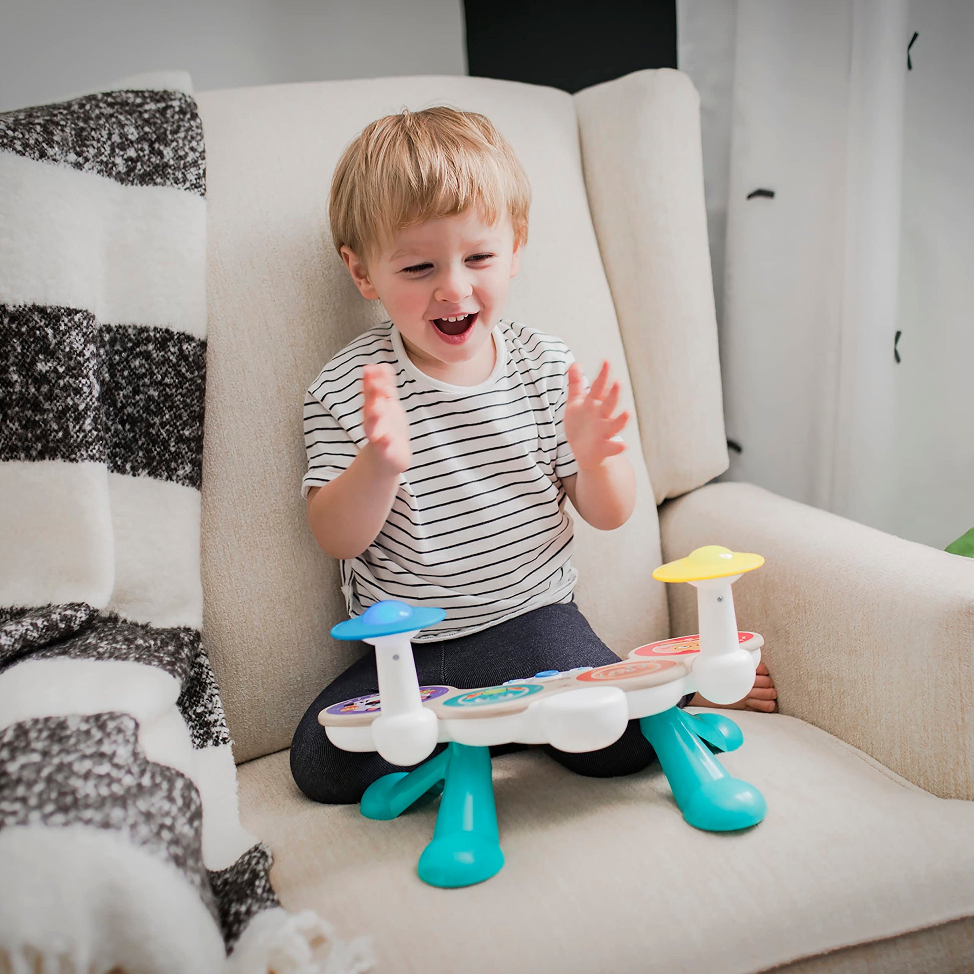 Baby Einstein Together in Tune Drums toddler musical toy with wireless wooden drums, suitable for ages 12 months+.