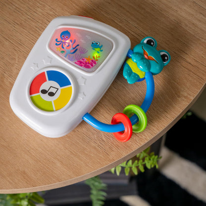 Baby Einstein Ocean Explorers musical light-up toy for babies 3+ months, featuring colorful marine animal designs and interactive lights.
