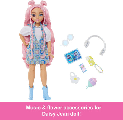 Barbie Dream Besties Daisy Jean fashion doll with wavy pink hair, removable outfits, and DJ-themed accessories.