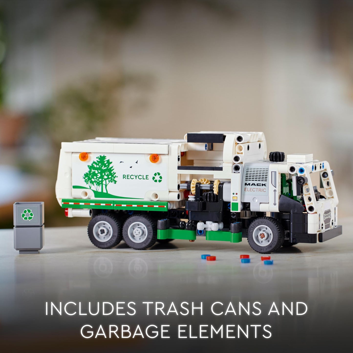 LEGO Technic Mack LR Electric Garbage Truck toy with realistic features and recycling bin, suitable for ages 8 and up.