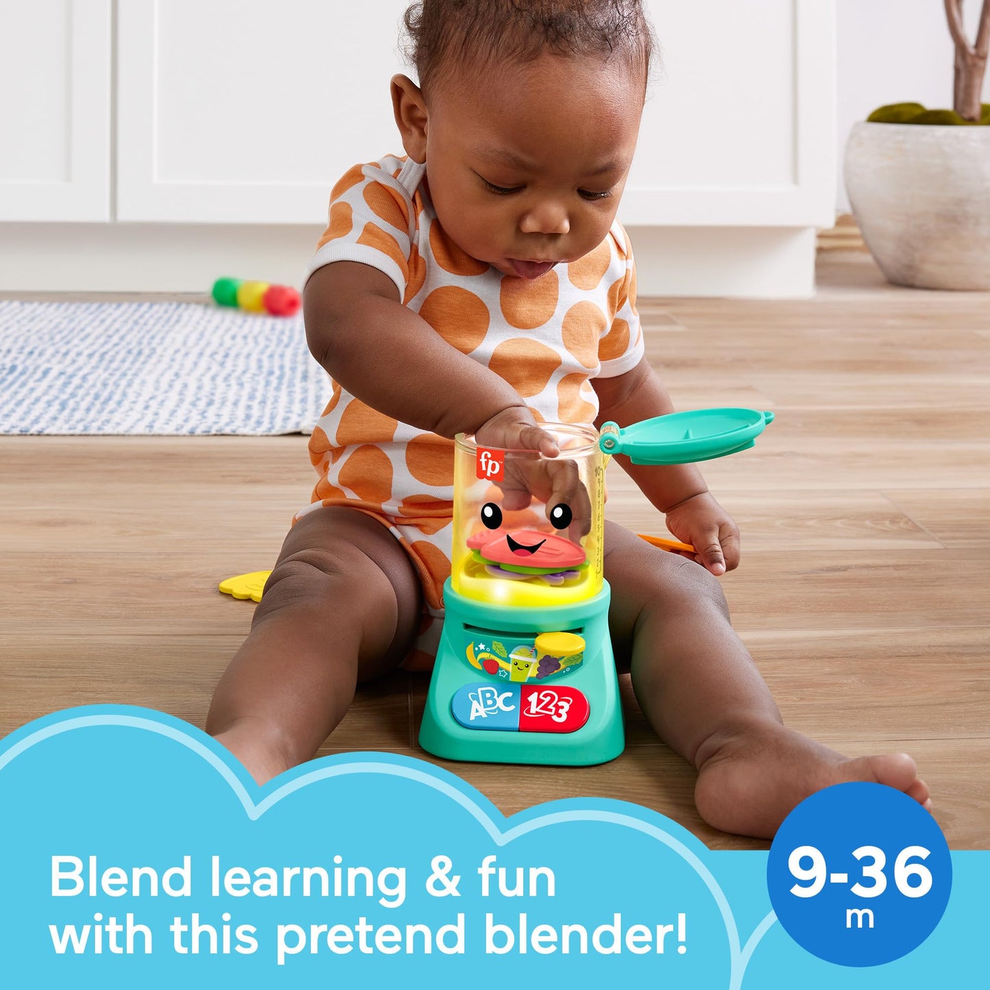 Fisher-Price Laugh & Learn toy smoothie maker with colorful buttons, lights, and music for babies and toddlers aged 9+ months.