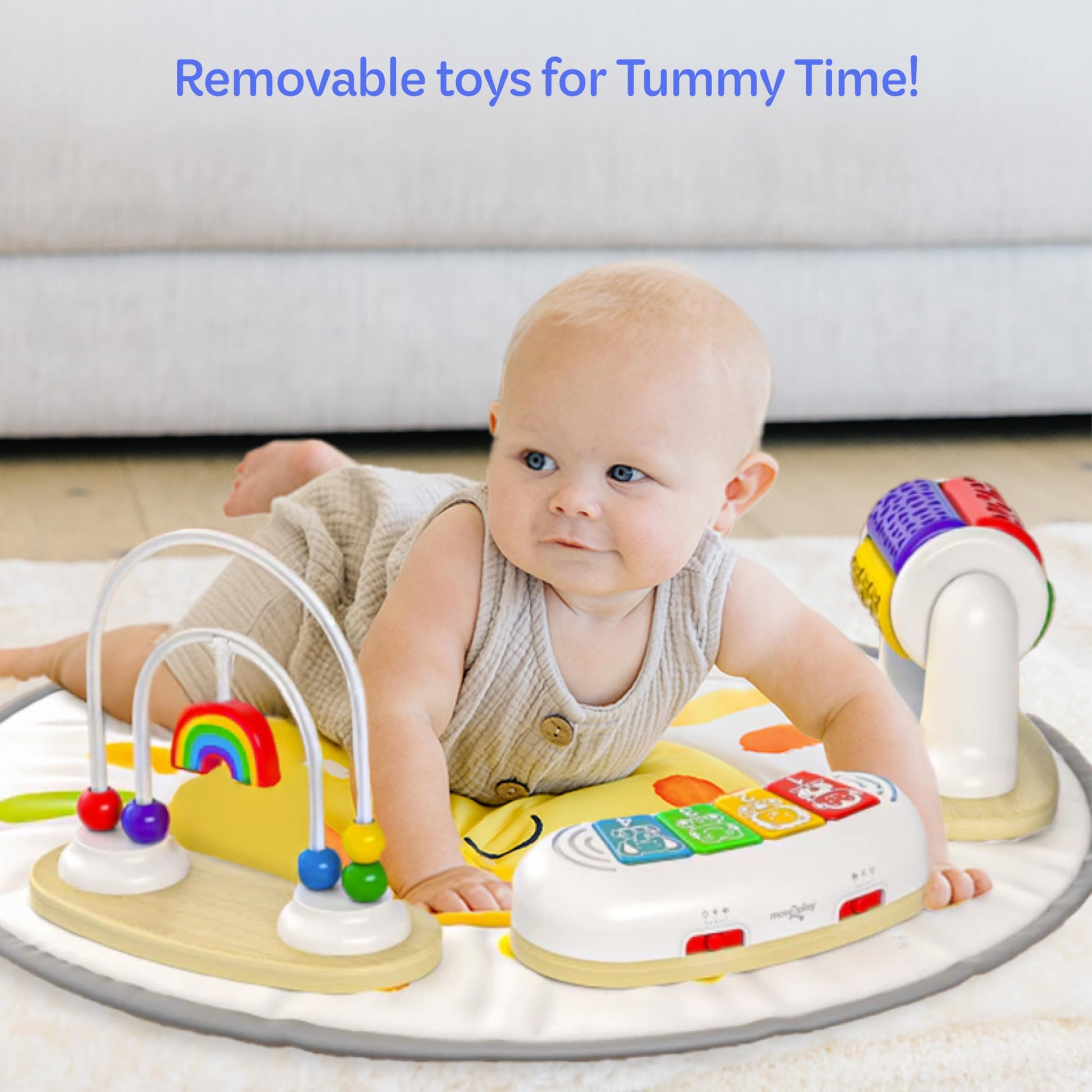 Move2Play 4-in-1 baby activity center with colorful toys, sun mat, and adjustable features for tummy time, jumper, and exersaucer use.