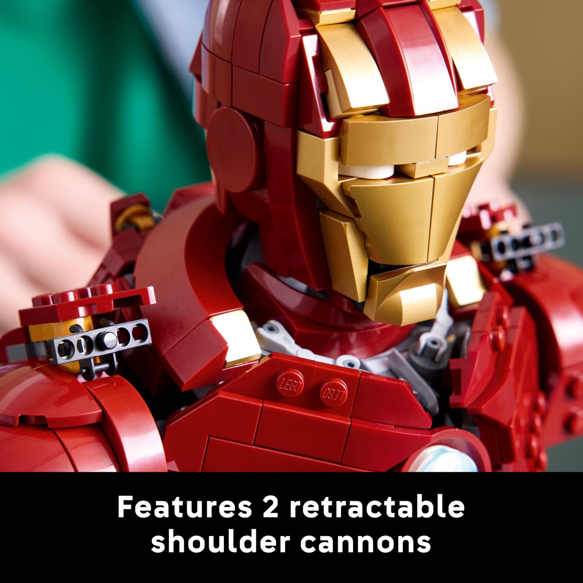 LEGO Marvel Iron Man MK4 Bust model with Tony Stark minifigure, shoulder cannons, and rotating head for display.