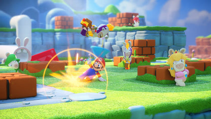 Nintendo Switch game cartridge for Mario + Rabbids Kingdom Battle by Ubisoft, featuring colorful characters on the game cover.