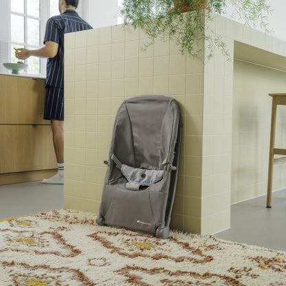 Bebeconfort Aster baby rocker with adjustable backrest, removable toy arch, 3-point harness, lightweight, ultra-flat fold, tinted graphite