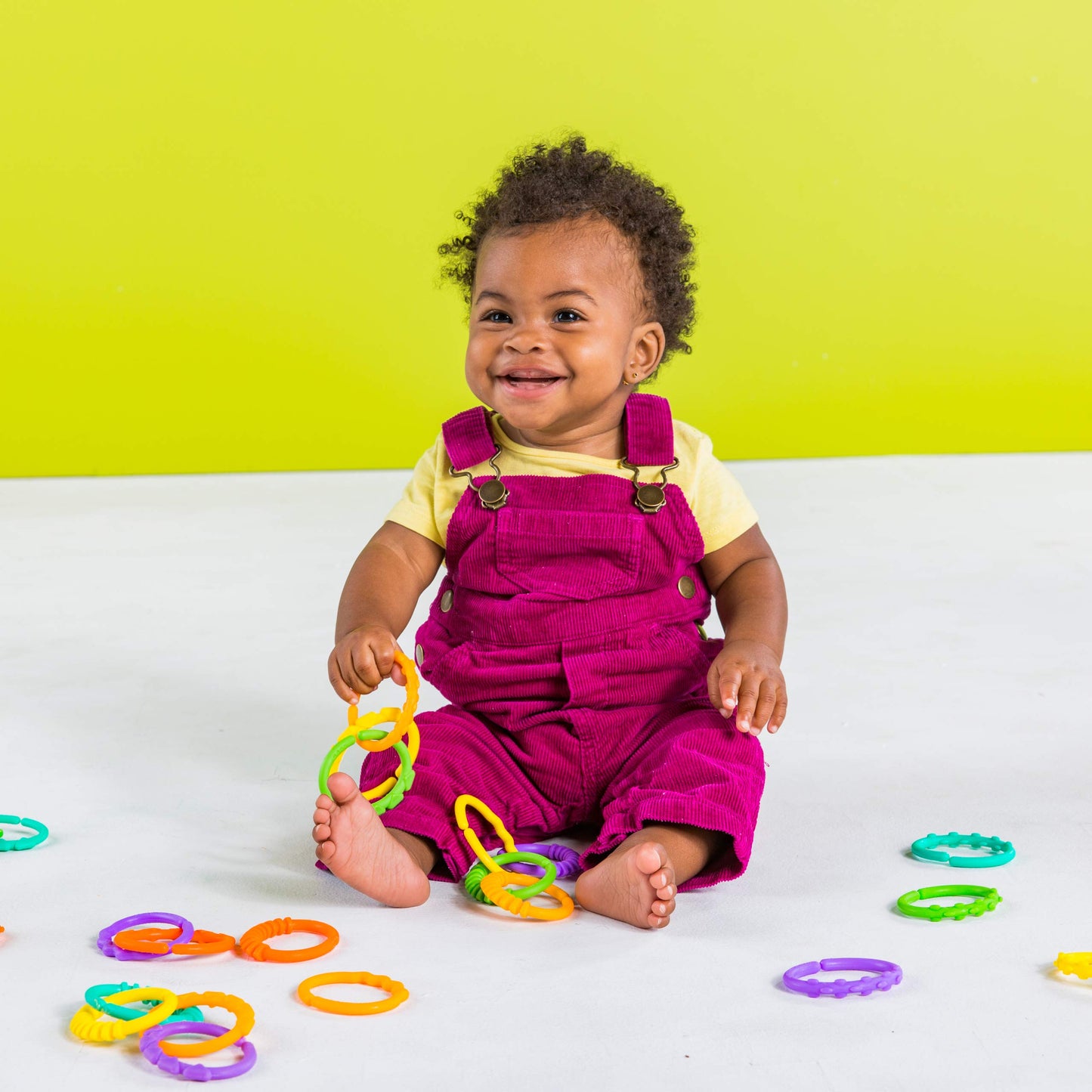 Bright Starts Lots of Links Rings Toys in vibrant colors, BPA-free, designed for stroller or carrier seat, suitable for ages 0 months+