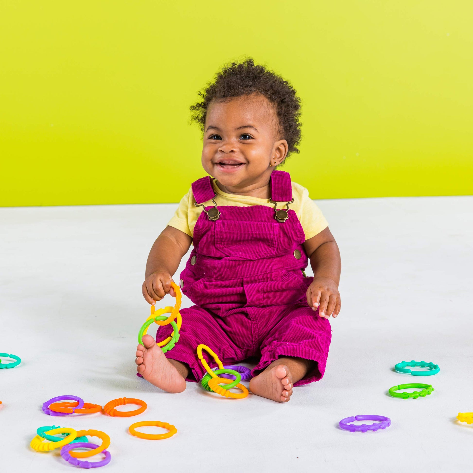 Bright Starts Lots of Links Rings Toys in vibrant colors, BPA-free, designed for stroller or carrier seat, suitable for ages 0 months+