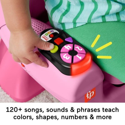 Fisher-Price Laugh & Learn toddler learning toy chair in pink with music lights and activities for ages 1+ in multiple languages.