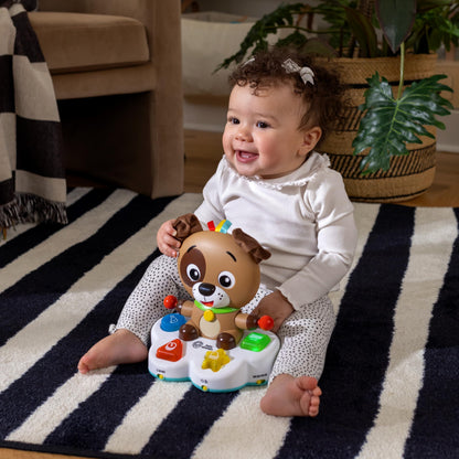 Baby Einstein Drum & Learn Dean musical learning toy with colorful buttons and drum for multisensory play ages 6 months and up.