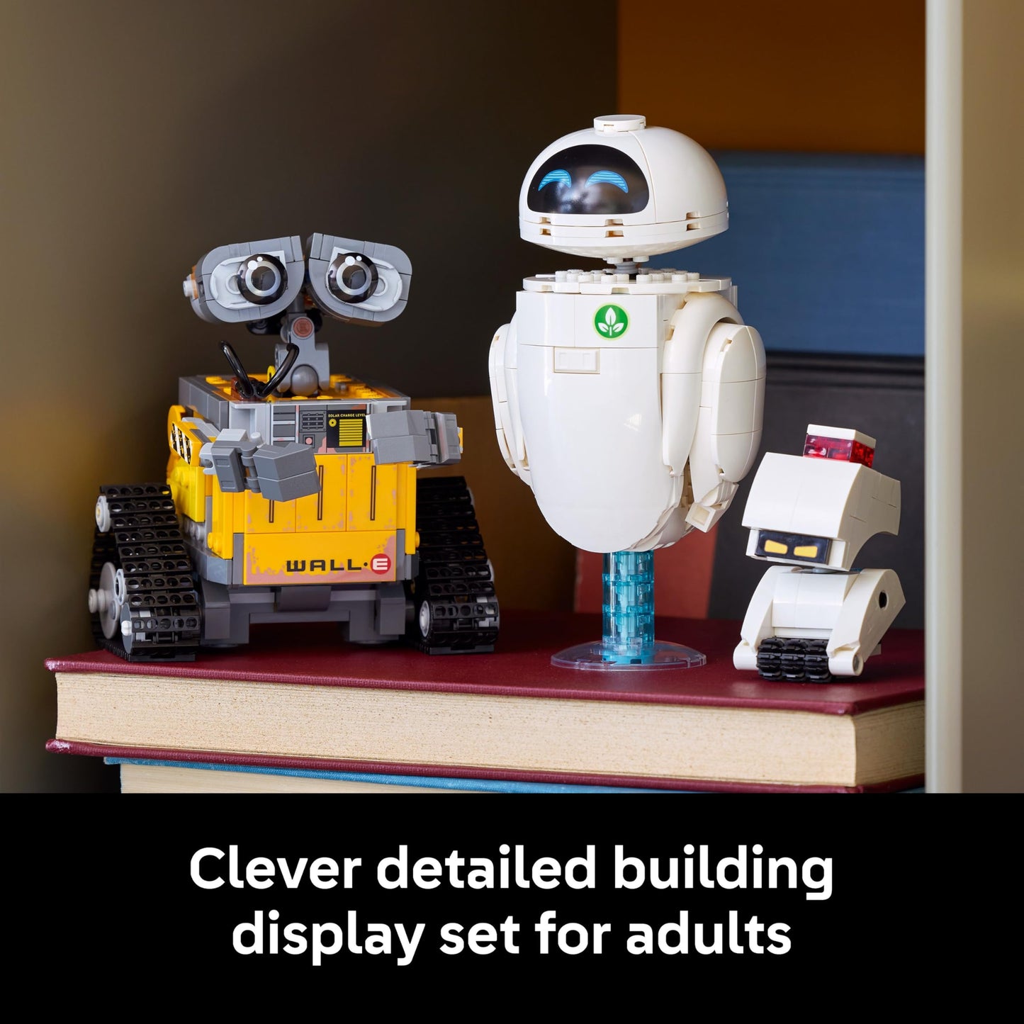 LEGO Disney Pixar WALL-E and EVE display model kit with M-O and Hal figures, showcasing brick-built robots for adult collectors.