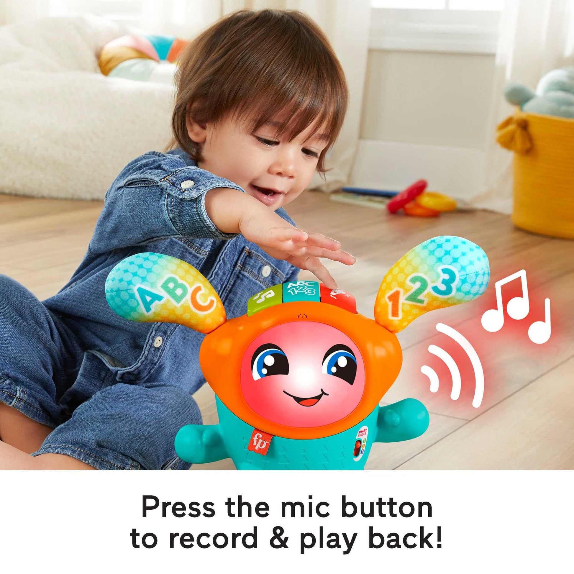 Fisher-Price DJ Bouncin’ Beats baby musical learning toy with colorful buttons and bouncing feature for early musical development.