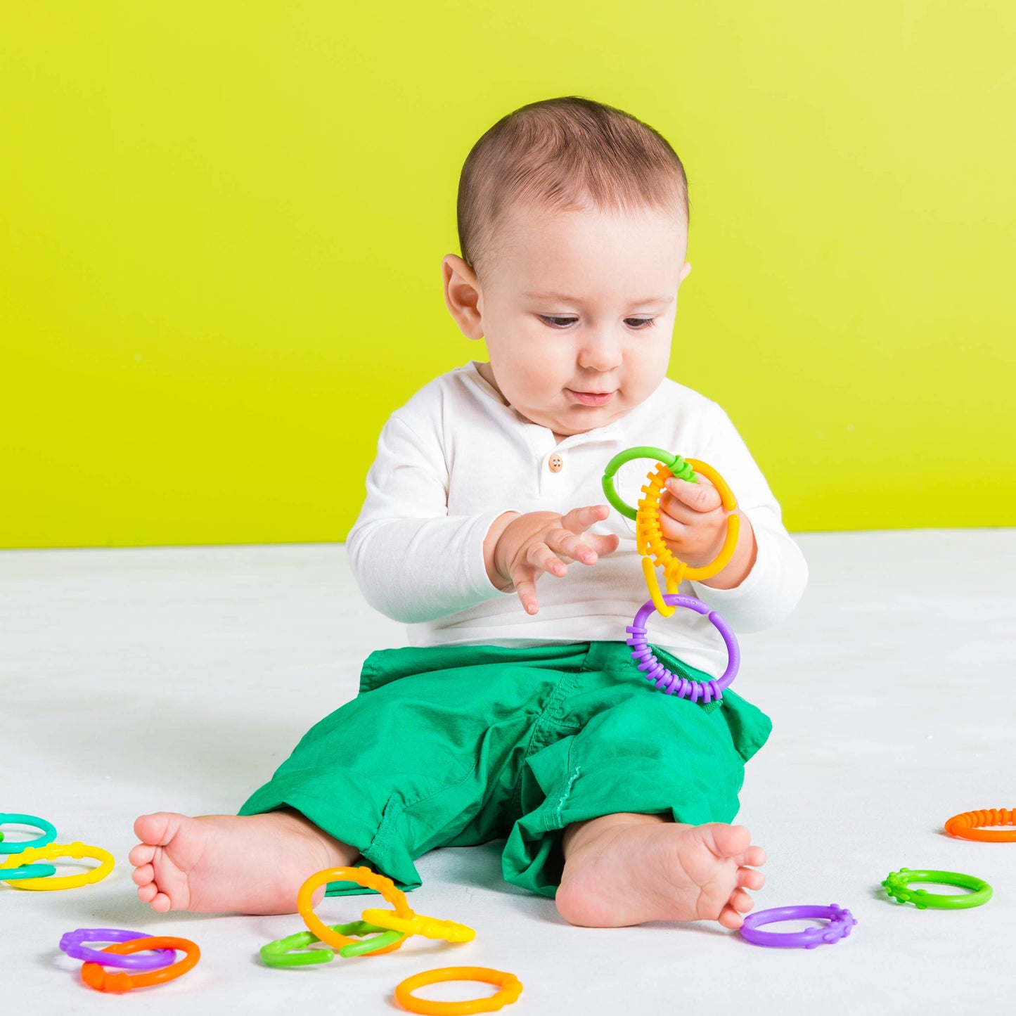 Bright Starts Lots of Links Rings Toys in various colors, BPA-free, designed for strollers and carriers, suitable for ages 0 months+