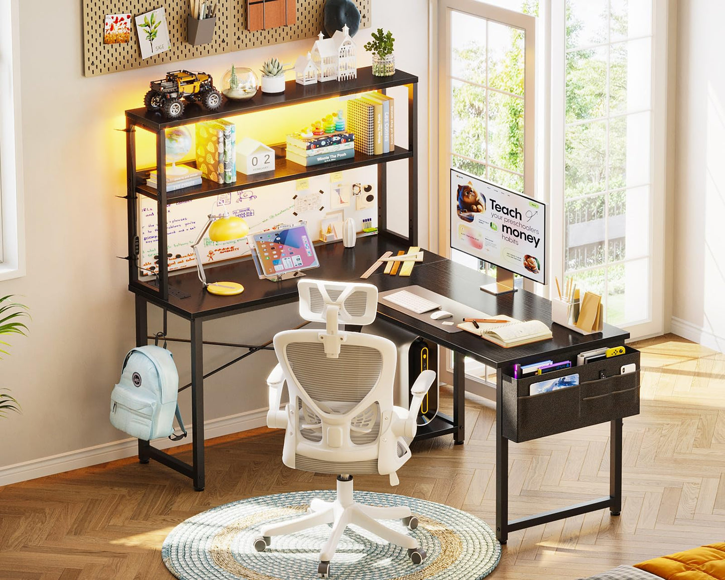 Black Coleshome L-shaped gaming desk with LED lights, power outlet, shelves, storage bag, and hook for home office use.