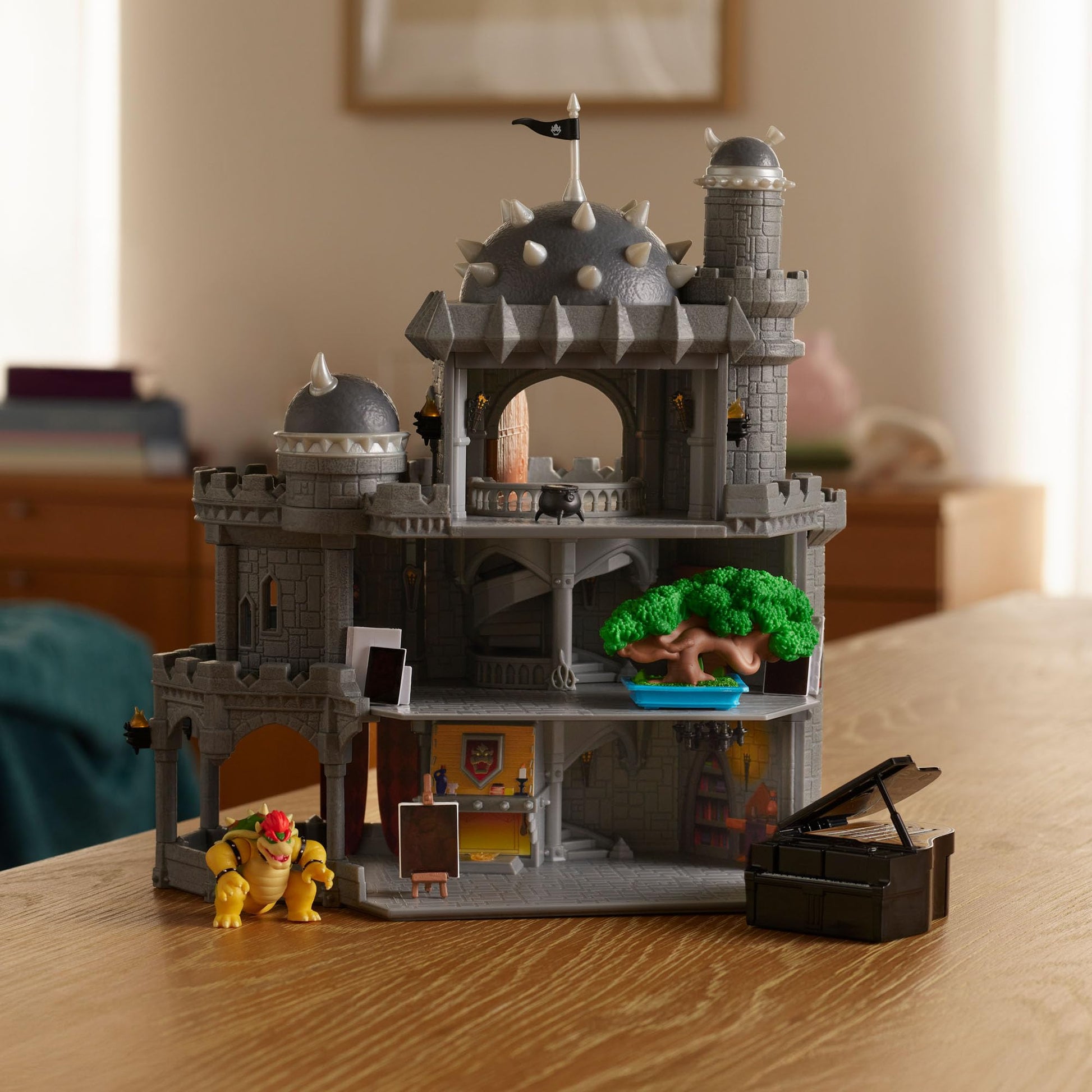 Super Mario Galaxy Movie Bowser Castle playset with mini figure, character accessories, and three levels of play in a detailed toy set.