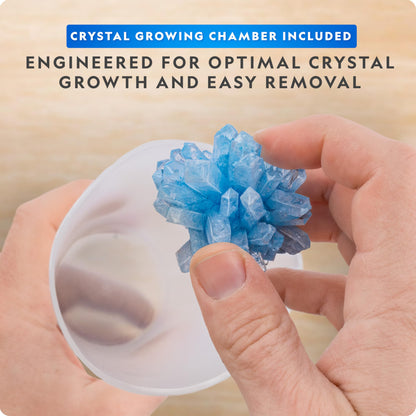 Blue Marble National Geographic crystal growing kit with colorful crystals, light-up stand, gemstone specimens, geode, and fluorite.