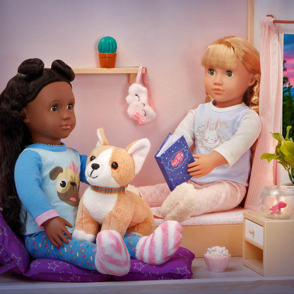 Our Generation 46 cm sleepover doll in pajamas with a soft toy rabbit, ideal for kids ages 3-8 during cozy sleepovers.