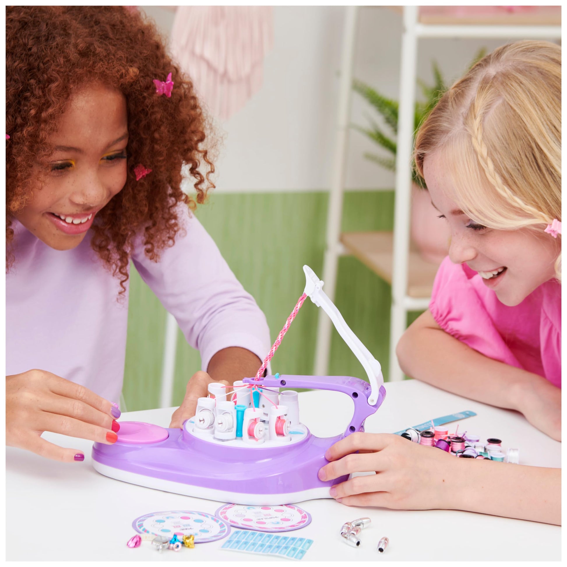 Cool MAKER KumiKreator bead and braider kit with colorful beads, strings, and tools for making friendship necklaces and bracelets for kids.