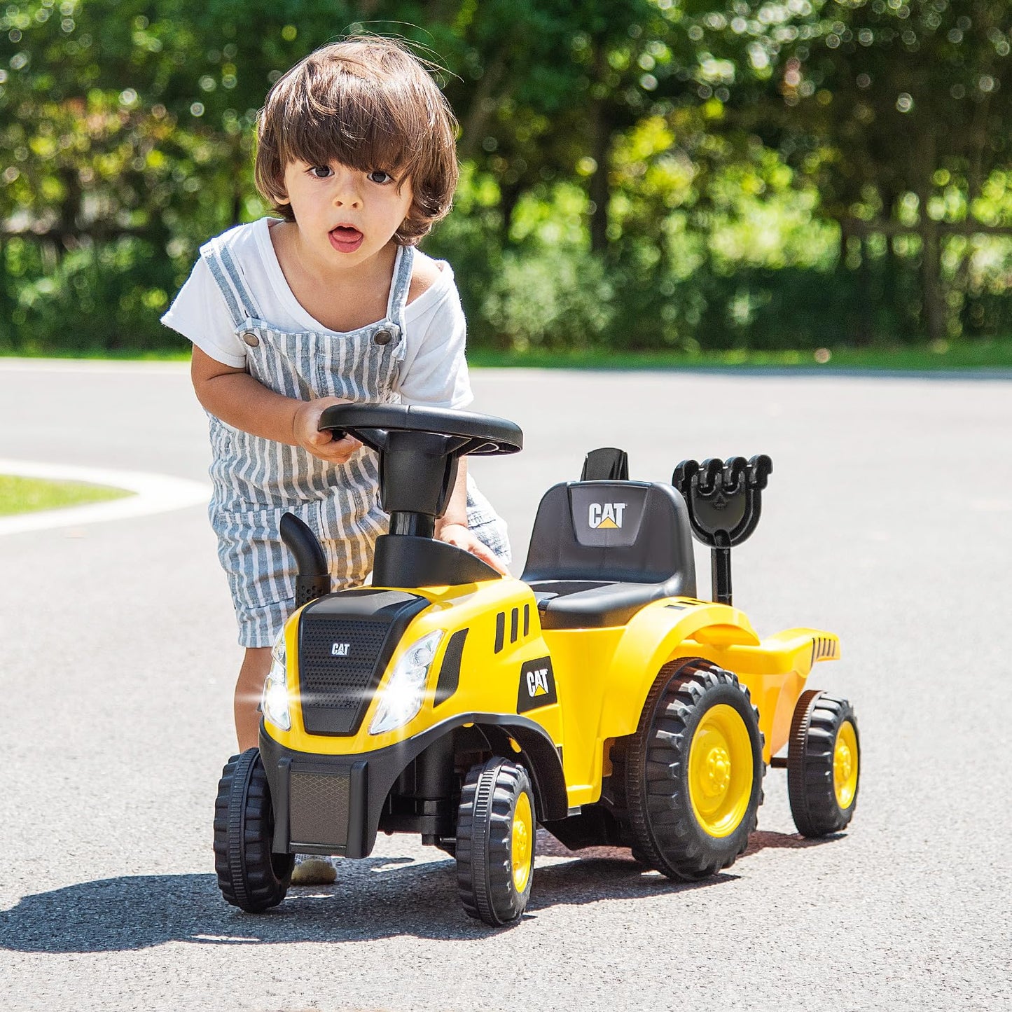 COSTWAY Kids ride-on tractor with LED lights, horn, detachable trailer, rake, shovel, and foot-to-floor design for toddlers 12-36 months.