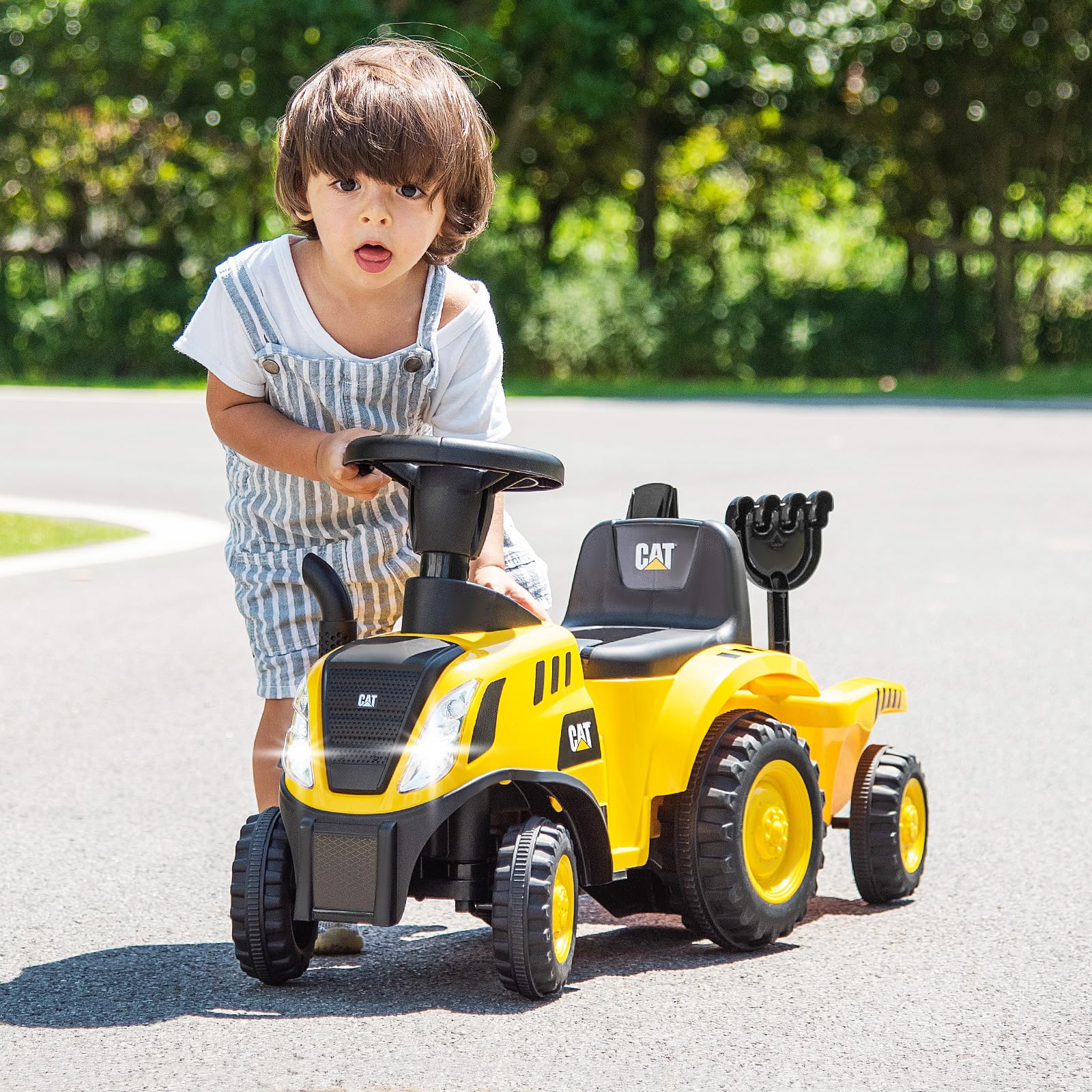 COSTWAY Kids ride-on tractor with LED lights, horn, detachable trailer, rake, shovel, and foot-to-floor design for toddlers 12-36 months.