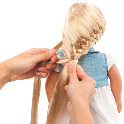 Our Generation Phoebe fashion doll with complete outfit, accessories, hair extensions, and comb for kids' playtime adventures.