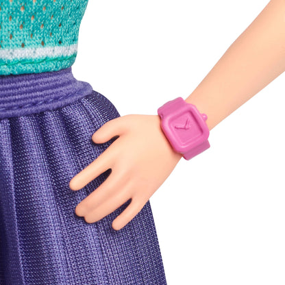 Barbie Fashionistas Doll #232 with red hair, sporty "B" jersey top, pleated purple skirt, watch, and sneakers.