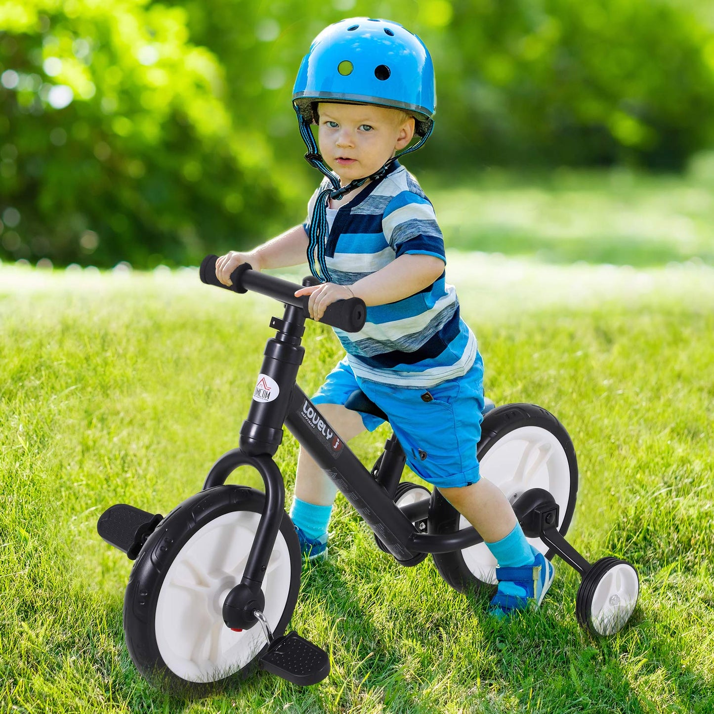 HOMCOM 11-inch kids balance bike with removable stabilizers, adjustable seat, and EVA tyres for ages 2 to 5, in black.