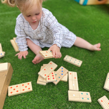 Set of wooden giant dominoes for kids by Jaques of London, outdoor garden game with large numbered tiles for children.