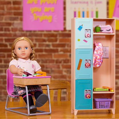 Our Generation Off To School doll accessories set includes a backpack, books, notebook, and more for children's imaginative play.