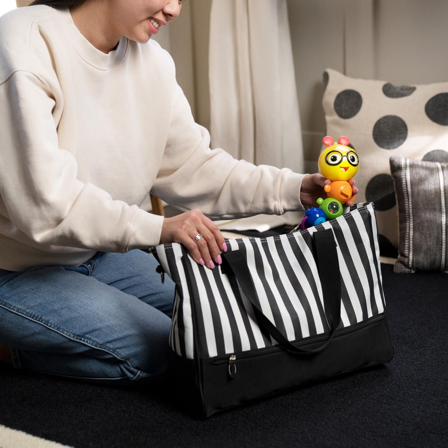 Baby Einstein Twist-a-Pal Cal sensory toy with music and bead chaser, designed for babies 6 months and up.