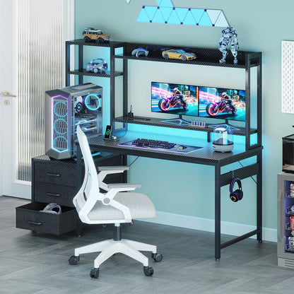Coleshome gaming desk in black with drawers, display shelves, LED lights, monitor stand, sockets, and carbon fiber finish.