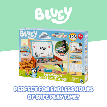 Bluey 102D Creation Station for kids, a blue 2-in-1 magnetic whiteboard and lap tray with compartments for learning and snacks.