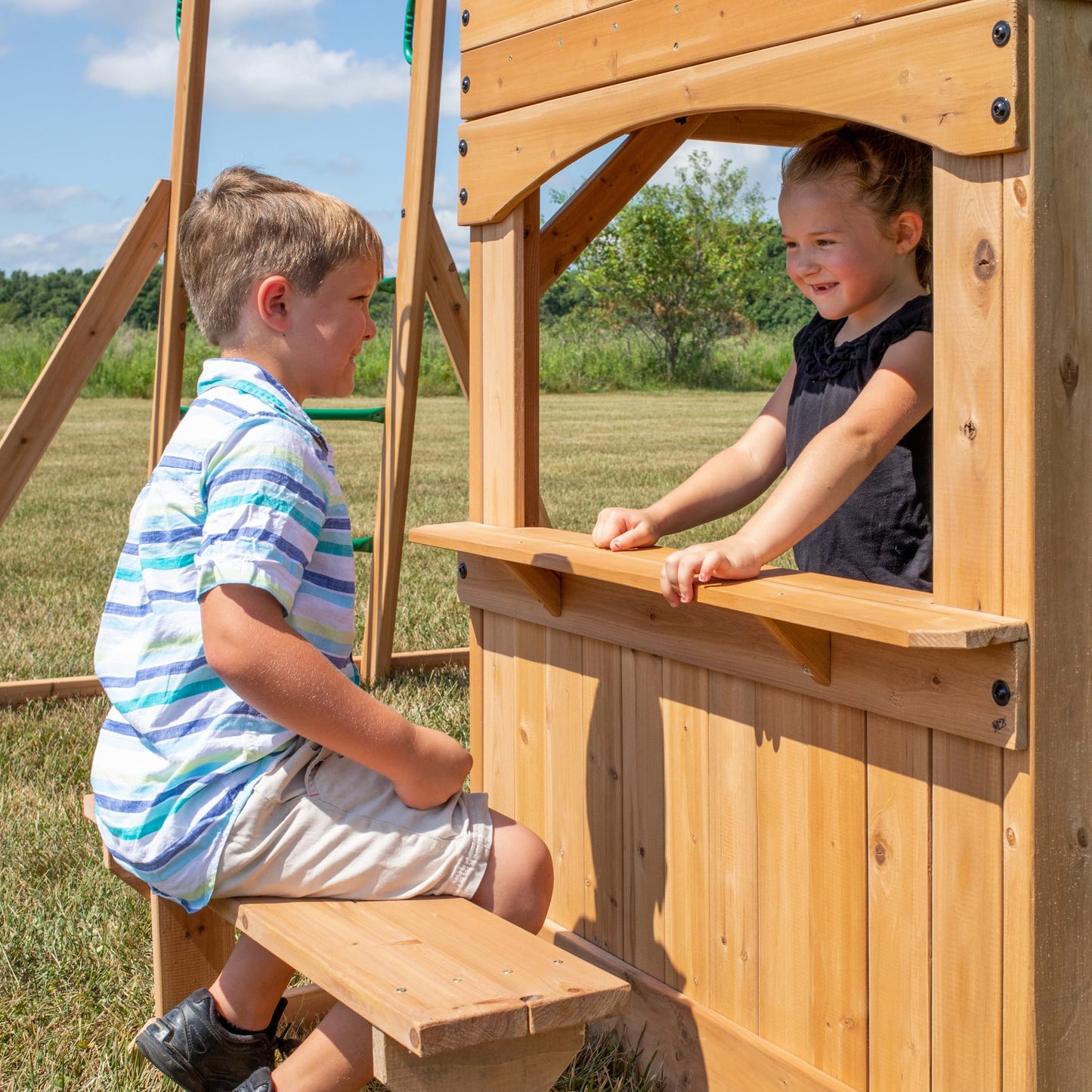 Backyard Discovery Montpelier 100% Cedar Wood Swing Set | Outdoor Playground for Kids | Garden Climbing Frame for Children | 1 Trapeze and 2 Belt Swings | 2.4m Wave Slide | Moneky Bars