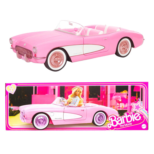 Vintage-inspired Barbie pink Corvette convertible with white wall tires and trunk storage, collectible toy car.