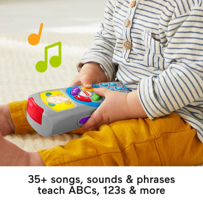 Fisher-Price Laugh and Learn remote toy with light-up screen, push buttons, and 35+ sing-along songs for baby early development