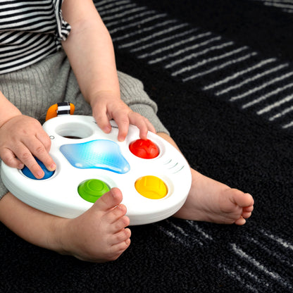 Baby Einstein Color Palette Popper sensory fidget toy for infants ages 6 months and up, featuring colorful poppers and soft textures.