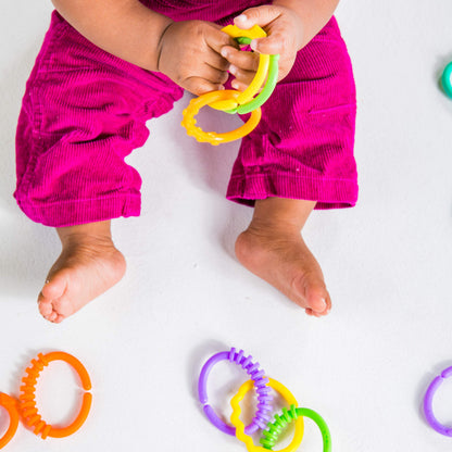 Bright Starts Lots of Links Rings toy set with 24 BPA-free colorful link rings for strollers or car seats for infants.